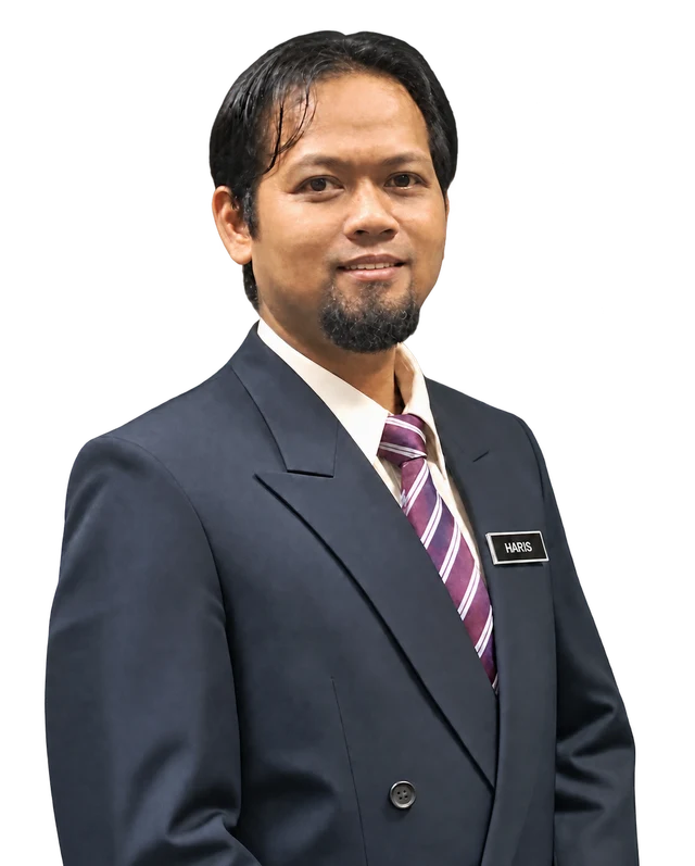 Cikgu Haris Harun tersenyum menyambut pengunjung